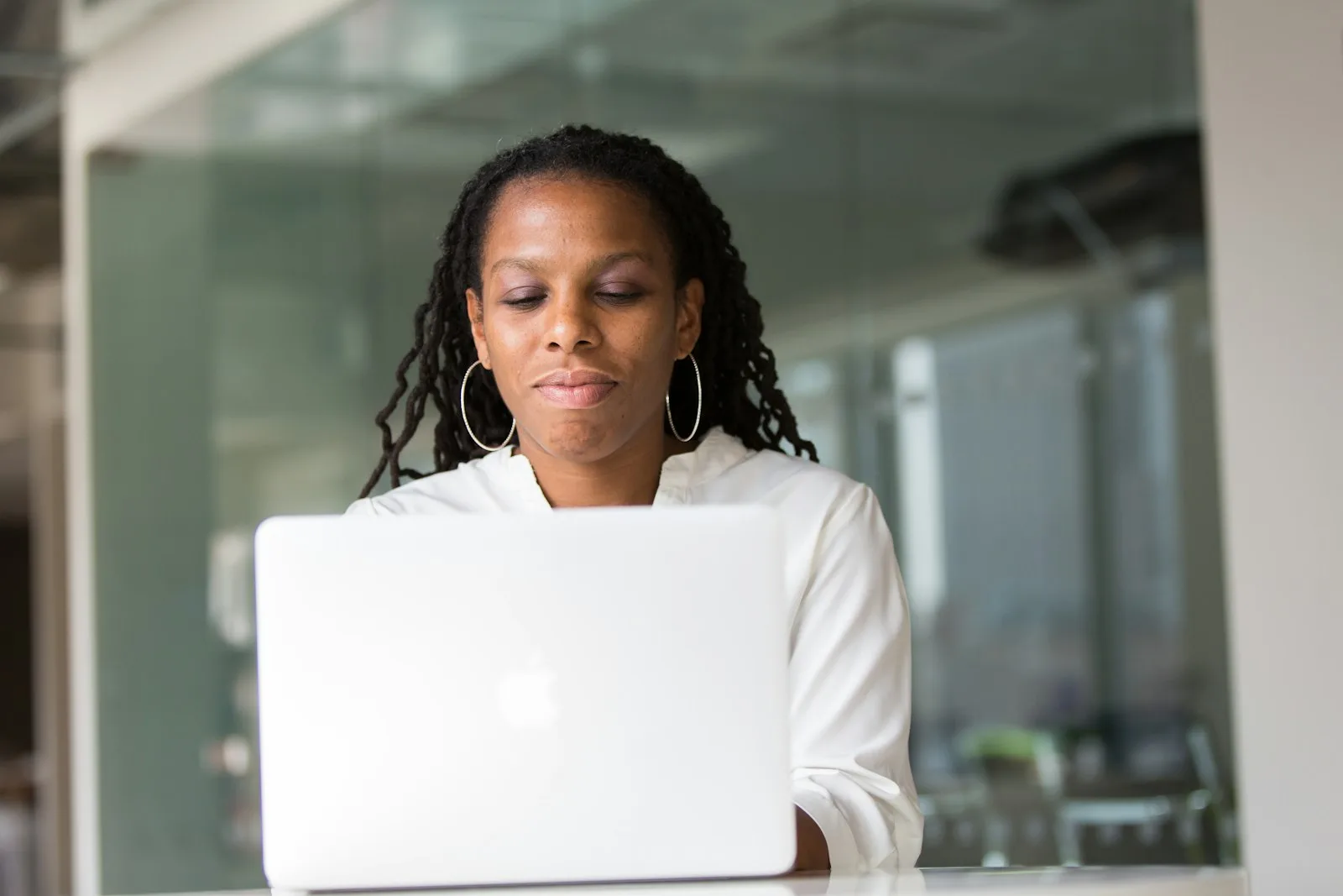 Black woman tech entrepreneur in a professional setting