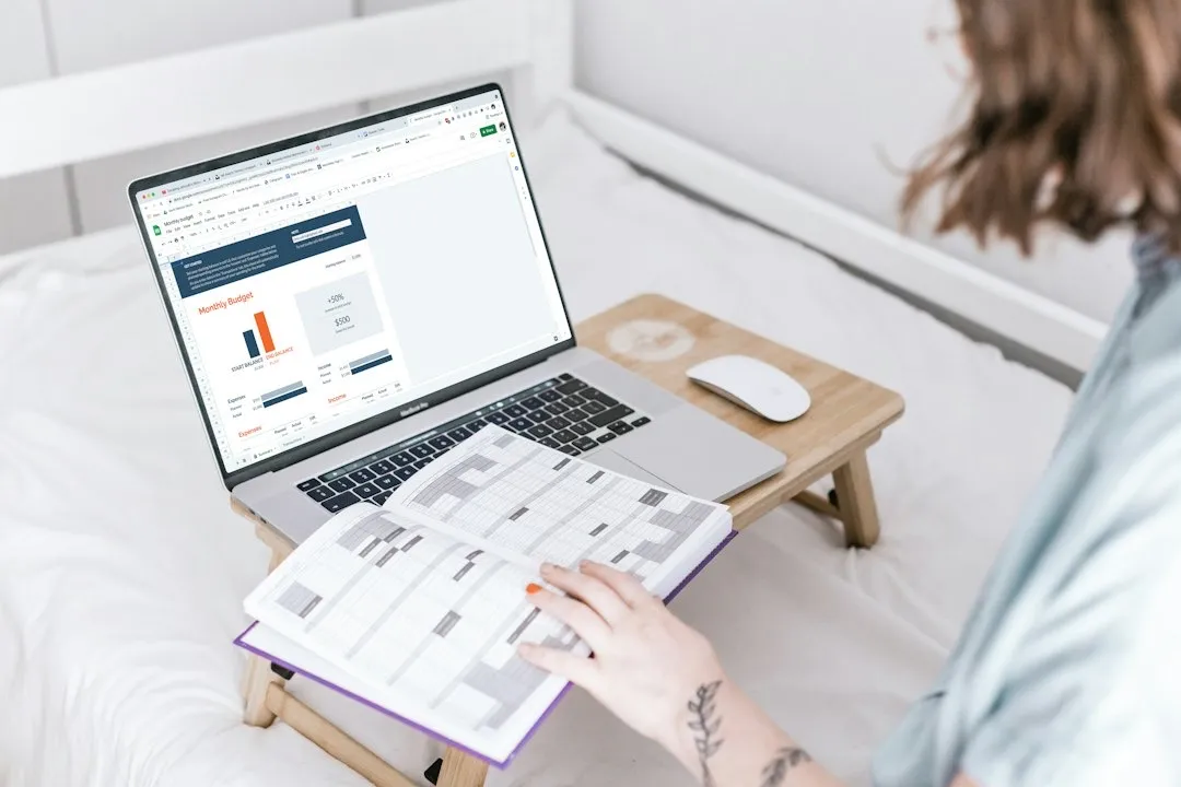 Woman entrepreneur reviewing grant application deadlines at her workspace