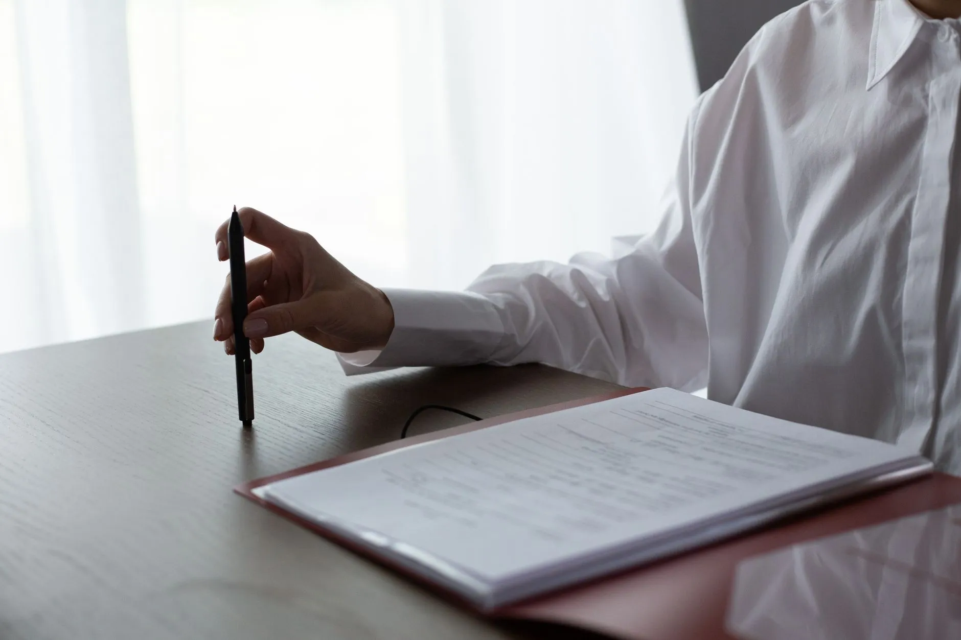 Woman professional reviewing government contract documents