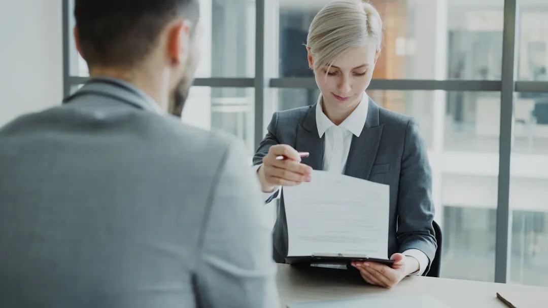 Woman meeting with an advisor to plan business succession