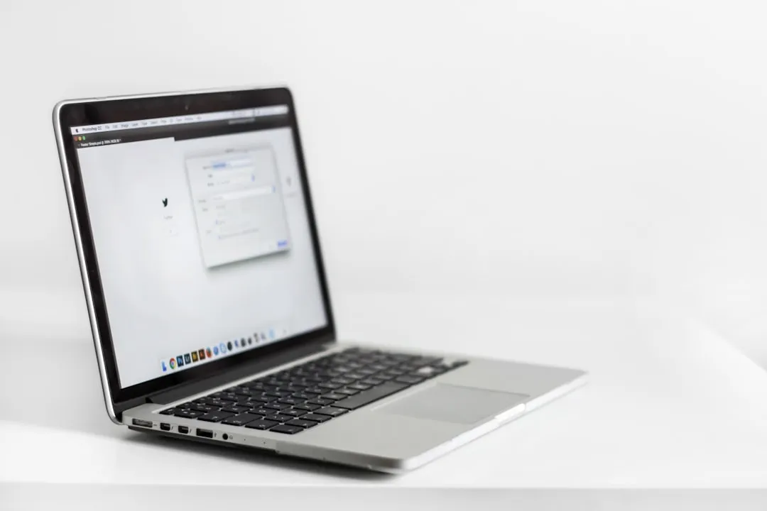 Government website submission process on laptop screen