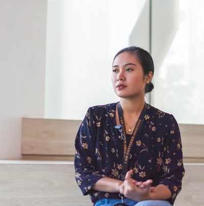 Asian woman in a tech startup workspace